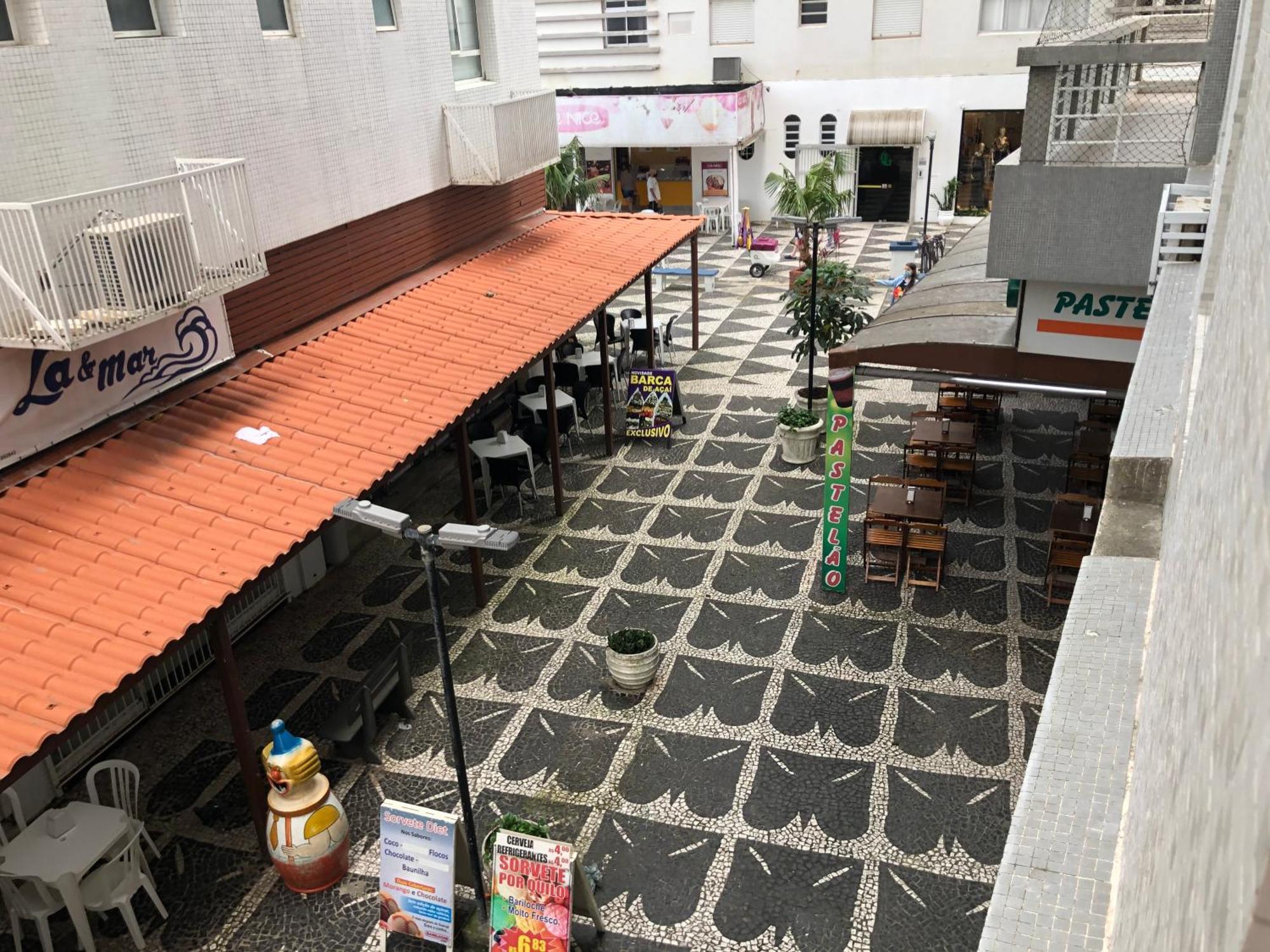 Lindo e moderno Estúdio pé na areia 50m do mar Guarujá Esterno foto